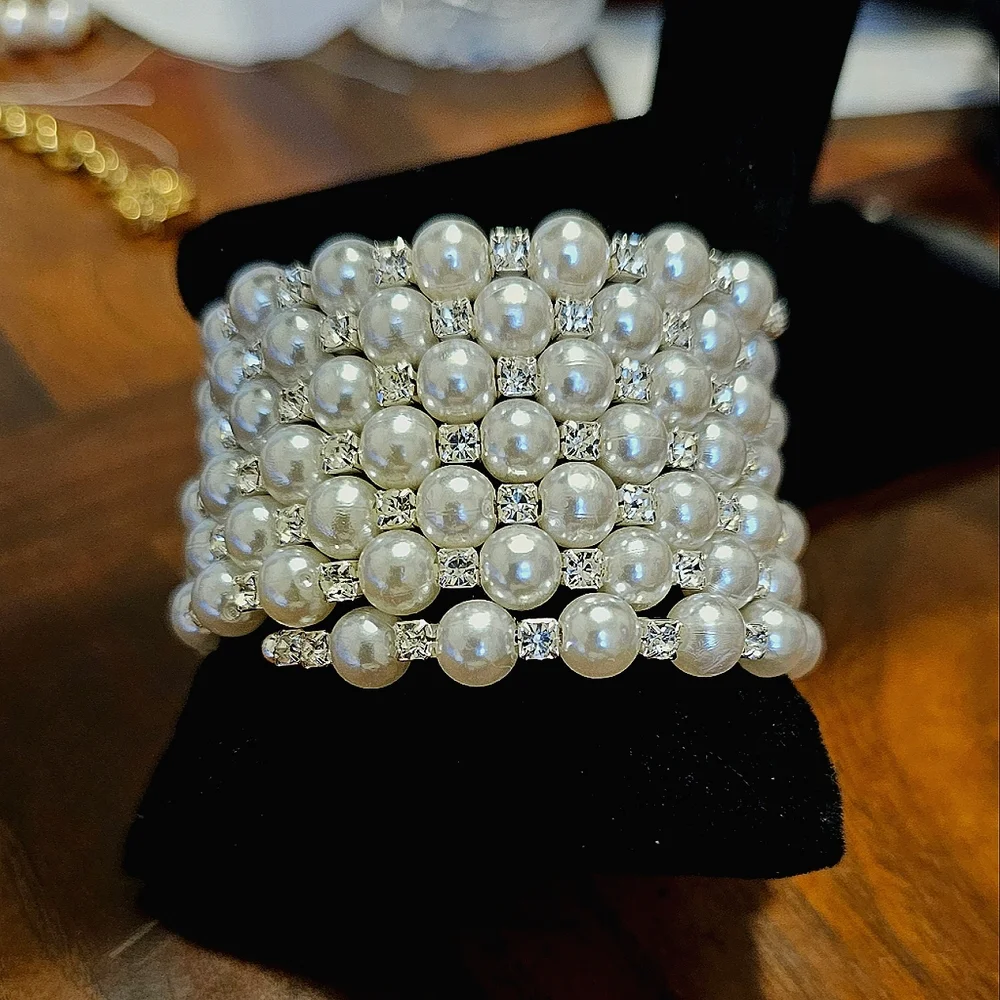 Gorgeous Finely Crafted Multi Strand Faux Pearl Bracelet With Rhinestones